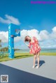 A woman in a red dress standing next to a basketball hoop.